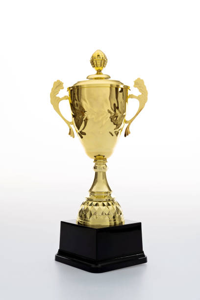 golden trophy on white background - effort gold indoors studio shot imagens e fotografias de stock