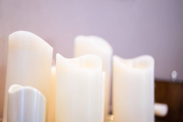 istock Soft white candles for spa treatments. relaxed concept 1472022043