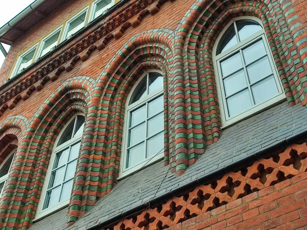 Detail of the facade of the historic Turn-Klubb in Hanover, decorated with red and green clinker bricks stock photo