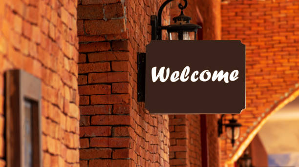 istock Outdoor brown sign with message Welcome 1472025215
