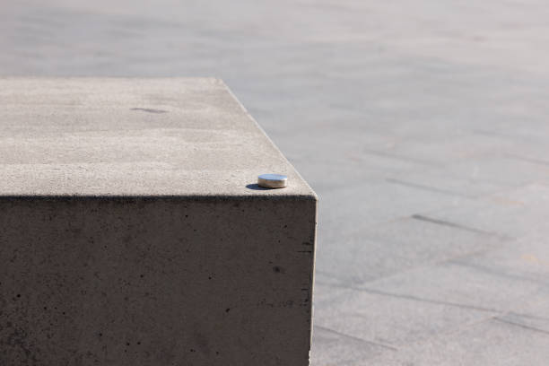 Front view of a lounge chair made from hard cement that can be placed outdoors for natural relaxation.