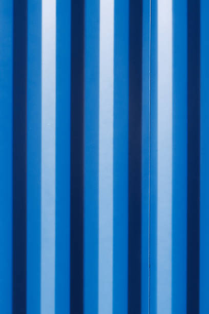 istock Part of a blue patterned metal fence 1472026570