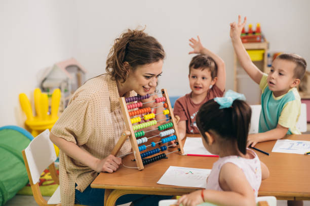 邦楽 BABY'S / TEACHER TEACHER 5,000+ Child Care Teacher Asian Stock Photos, Pictures