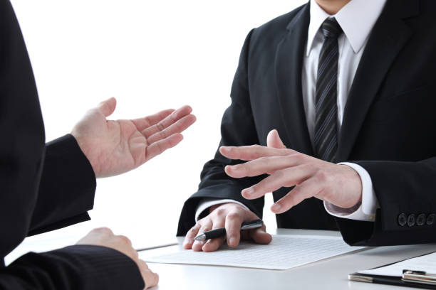 istock Business man speaking in meeting 1472033494