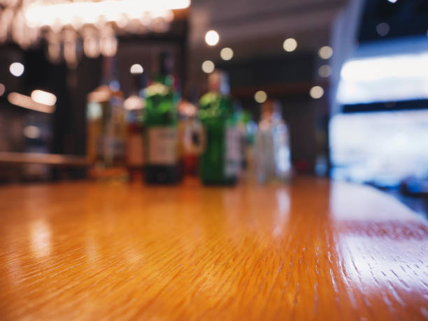 Table top counter bar with alcohol bottle drink stock photo