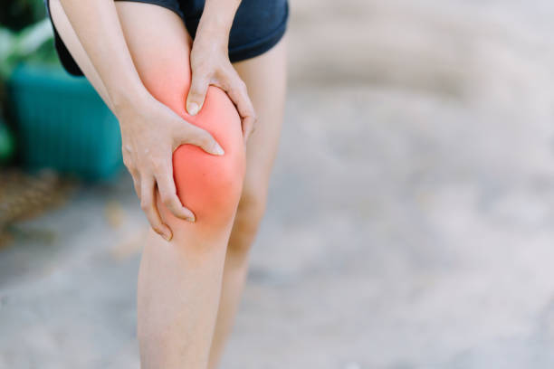 istock Woman hurts knee because of wrong exercise. 1472042312