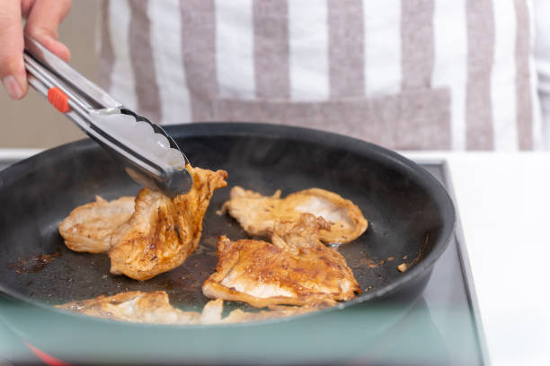 istock man in his 40s making ginger grill in the kitchen 1472049126