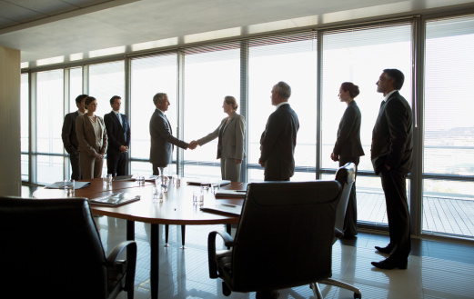 Client meeting, top view people and shaking hands for investment success, b2b contract deal or company acquisition. Business, teamwork and partner agreement, welcome or handshake in HR job interview
