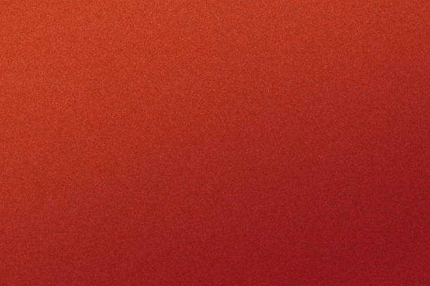 istock dark red glitter paper abstract, natural grunge texture background 1472053905