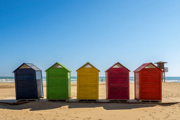 istock colorful huts on the beach 1472055453