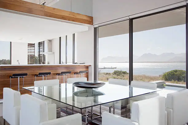 Photo of Modern dining room overlooking patio