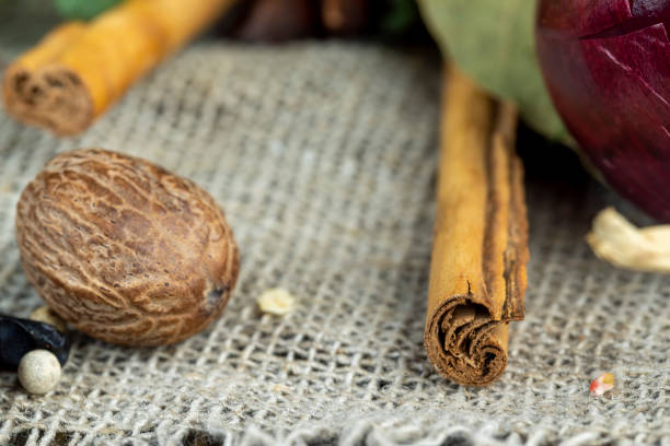 istock Fresh and fragrant cinnamon bark Sticks close-up 1472057470