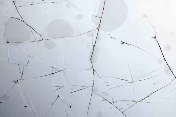 istock glass broken into a large number of pieces and cracks 1472057485