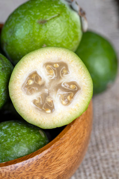 istock Ripe and soft green feijoa on the table 1472057585