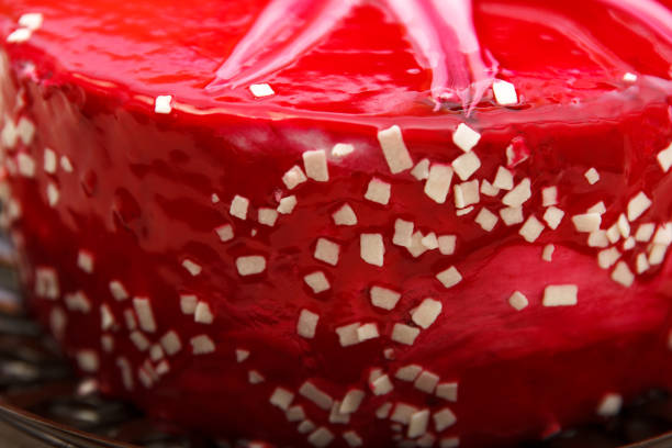 Close up of a creamy cheesecake with strawberries.