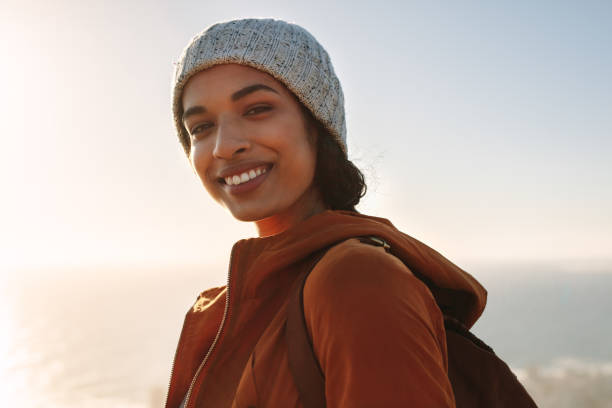 istock Female with backpack hiking on winter day 1472059498