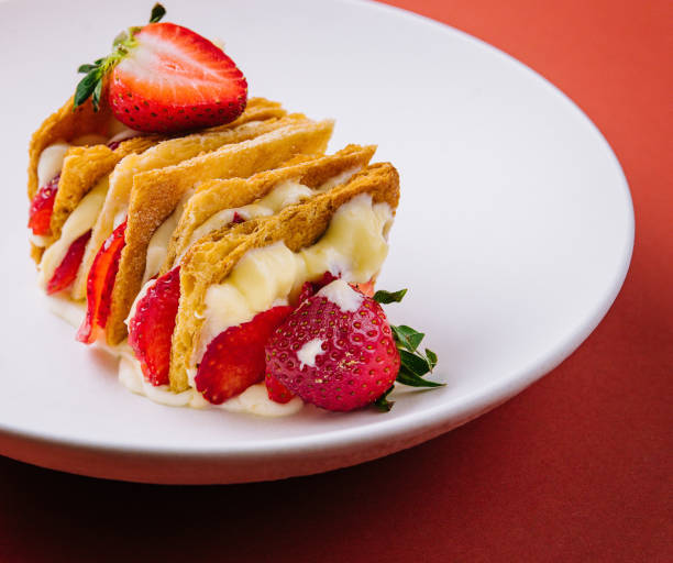 istock Strawberries and cream mille feuille dessert on plate 1472062071