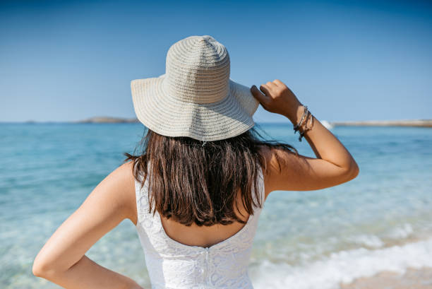 istock Young Woman Standing On The Beach In Thasos 1472068933