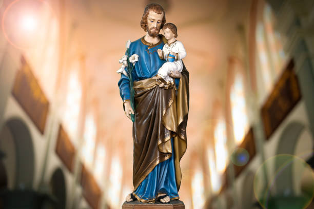 istock Saint Joseph and baby Jesus catholic image 1472069414