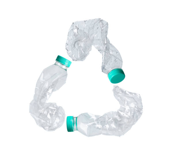 istock Plastic Bottle fall fly in mid air, pet plastic bottle floating explosion with green lid. Used twist water plastic bottles throw in air. White background isolated freeze motion high speed shutter 1472077032