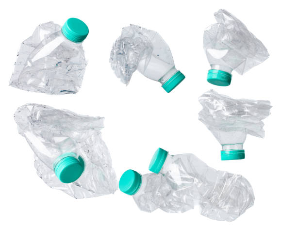 istock Plastic Bottle fall fly in mid air, pet plastic bottle floating explosion with green lid. Used twist water plastic bottles throw in air. White background isolated freeze motion high speed shutter 1472077264