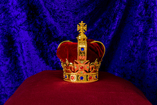 Replica of King Edwards Crown to be used by King King for his coronations sits on a purple cushion
