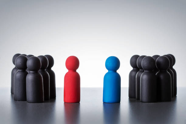 istock The conflict between the two teams, red against blue. negotiation concept. 1472082532