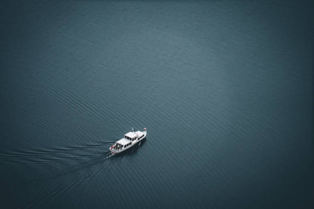 istock Yacht on a lake with people 1472082853