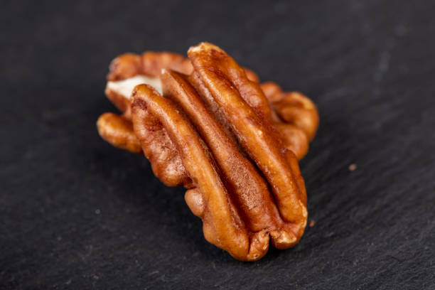 fresh crop of pecans on the surface, a few fresh and crispy pecans during cooking