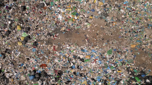 Top Down Aerial View Descending on Large Dumping Ground in the Suburbs of Mumbai, India