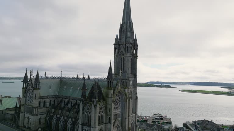 Aerial view of St. Colman's Cathedral in Cobh, jesus statue in church