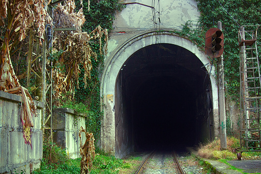 Railway tunnel in mountains. railroad tunnel, , defocused road in tunnel driving