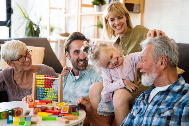 istock Cheerful multi-generation family having fun while spending time together at home. 1472088279