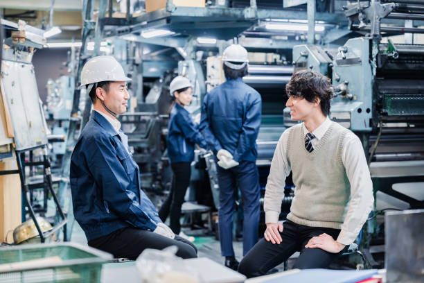 istock Male students undergoing an employment interview at a factory 1472096259