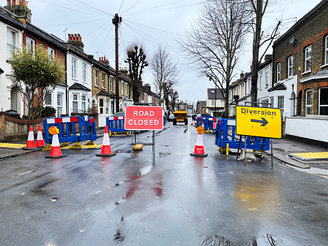 Road closed and diversions signs on a suburban road in London