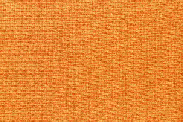 istock Orange cotton fabric cloth texture for background, natural textile pattern. 1472100557