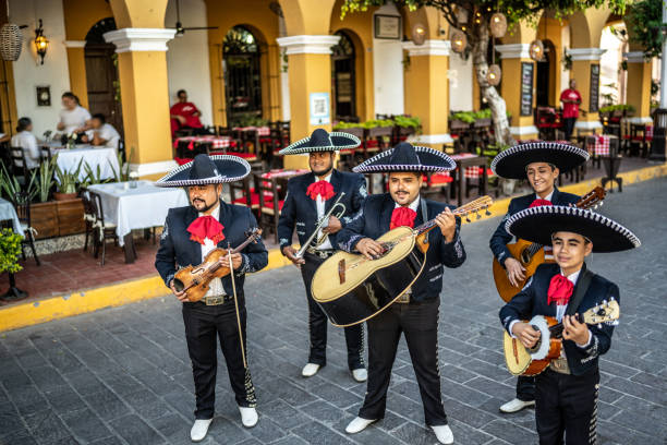 istock Group of traditional mariachis playing at the historic district 1472100583