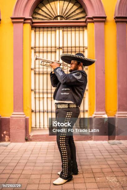 Traditional Mariachi Trumpeter Playing At The Historic District Stock Photo - Download Image Now