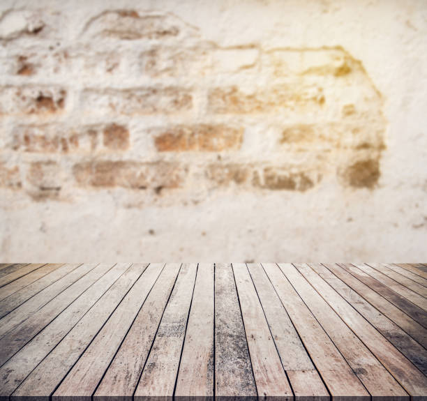 istock Old wood plank with abstract old and crack brick wall background for product display 1472103814