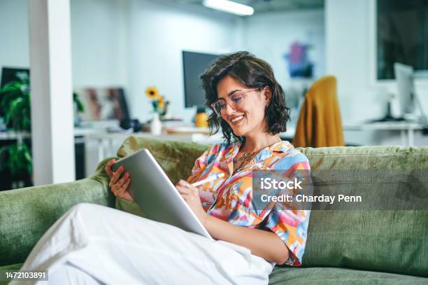 Businesswoman Using Digital Tablet In Office Stock Photo - Download Image Now - People, One Person, Digital Tablet