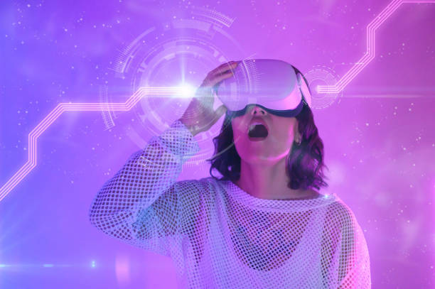 istock Woman with VR headset opening mouth in awe 1472104451