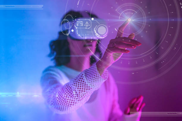 istock Close-up of woman's finger touching digital virtual screen 1472104559