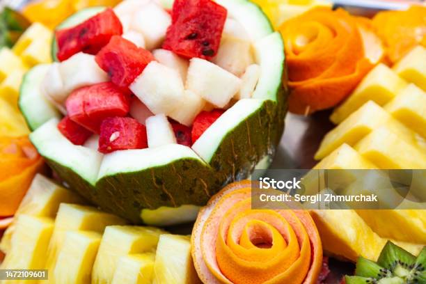 Decorative Fruit Salad On A Fruity Background Sliced Watermelon Melon Pineapple And Grapefruit Stock Photo - Download Image Now