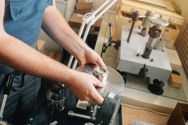 istock Repair and diagnostics of industrial devices. Instrument calibration specialist performs work at workplace in workshop. Hand closeup. 1472110740