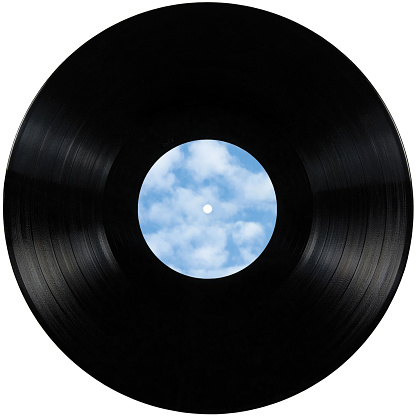 Black vinyl record lp album disk, isolated long play disc, blank empty label in sky blue, large detailed copy space background flat lay macro closeup, bright clouds, sunny summer cloudscape