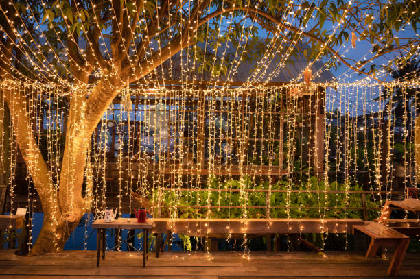 istock Tunnel with light bulb glowing decoration at outdoor 1472112084