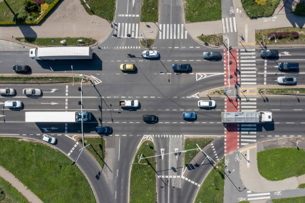 istock Traffic at the road intersection, aerial view 1472114053