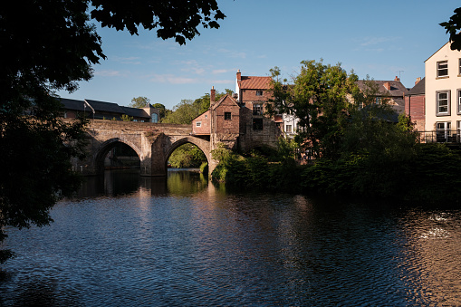 Durham England: 2022-06-07: Elvet Bridge on a warm sunny day on the River Wear