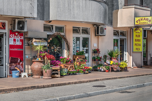 Budva, Montenegro - June 17, 2021: Flower Shop Cvjecara Liza in Budva. Shop decorated with various flower arrangements on Zrtava Fasizma street, 82 on a sunny day - outside view