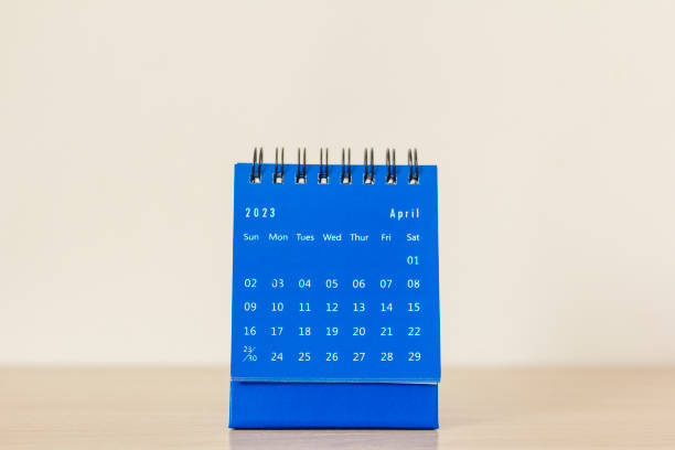 istock Desktop calendar for April 2023 on a light background. 1472115460